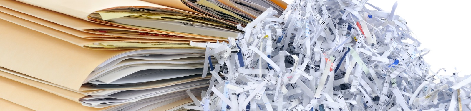 files and shredded papers