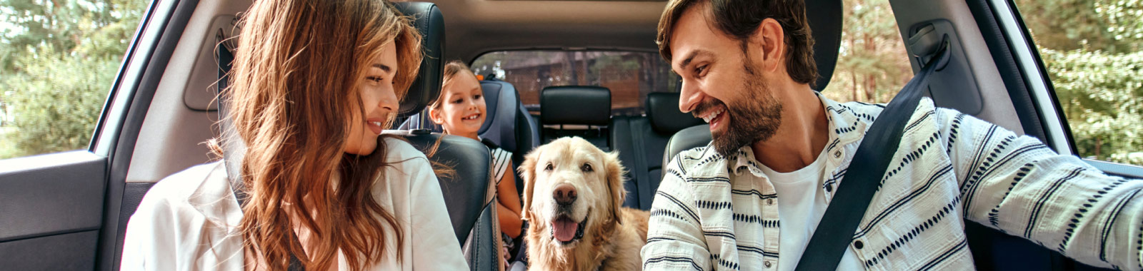 family in car