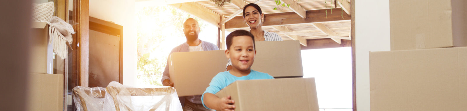 Family moving boxes for new home