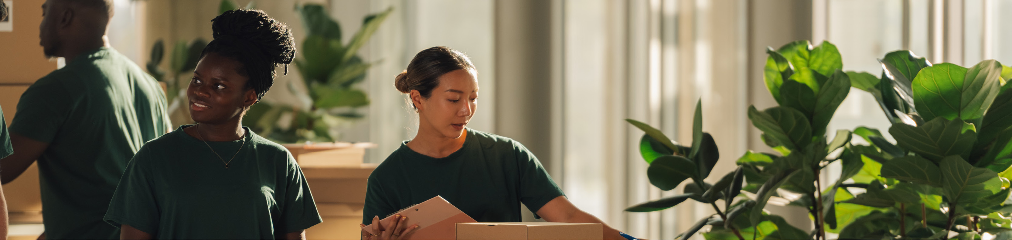 Two women volunteering at a donation center