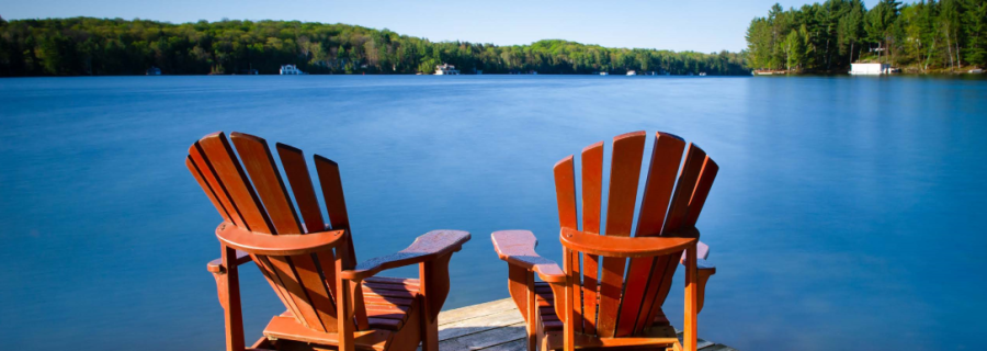 Chairs on dock of lake
